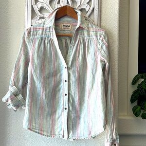 100% cotton. Button up.